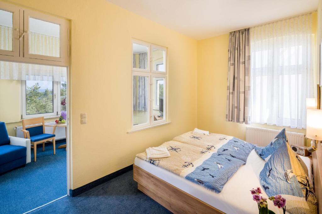 Postel nebo postele na pokoji v ubytování Hotel Seestern
