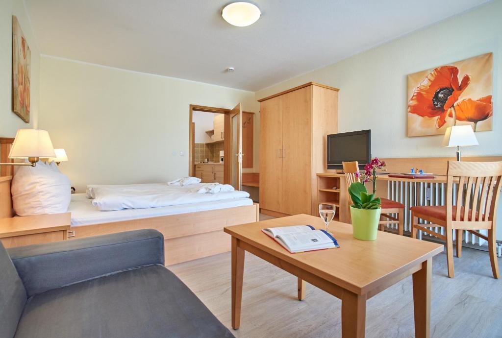 Postel nebo postele na pokoji v ubytování Apparthotel Minerva Diana Octavia