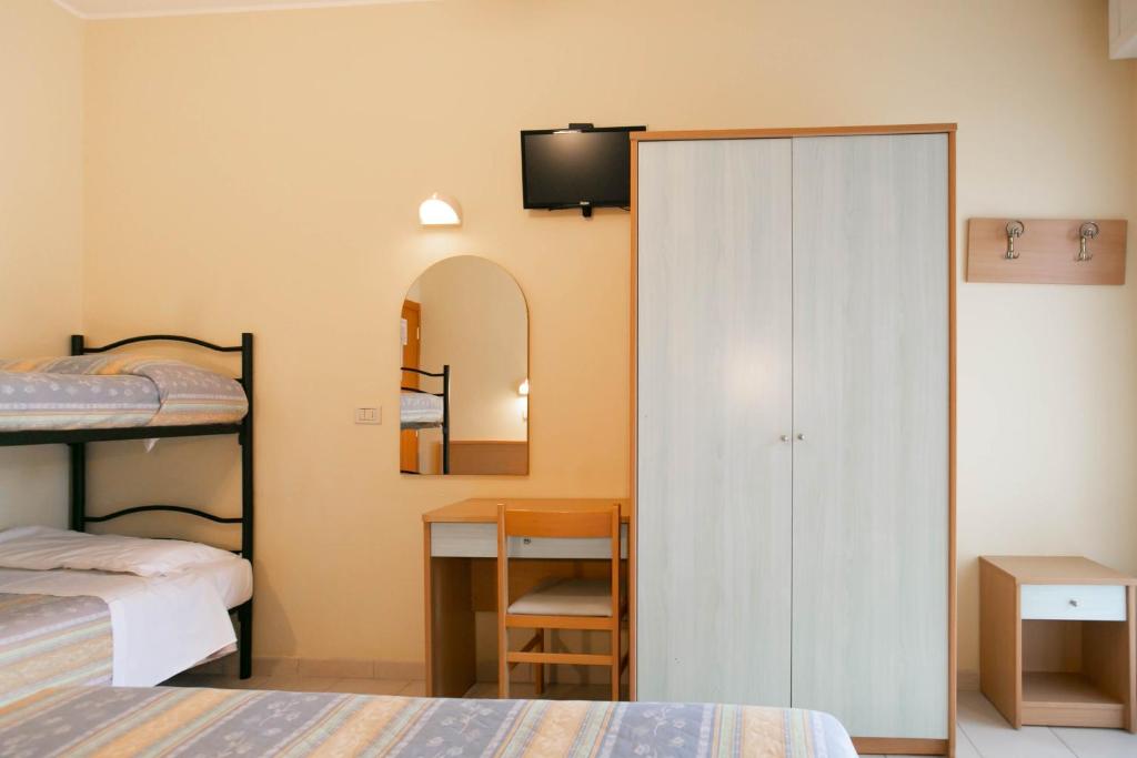 Postel nebo postele na pokoji v ubytování HOTEL VALPARAISO