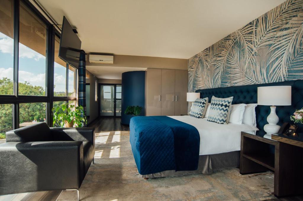 Letto o letti in una camera di Thaba Eco Hotel