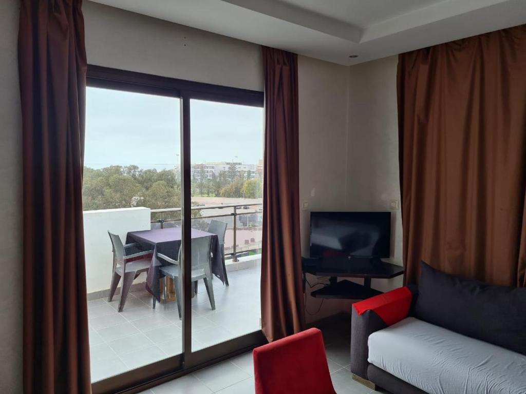 TV a/nebo společenská místnost v ubytování La Suite Hotel Agadir Adults Only
