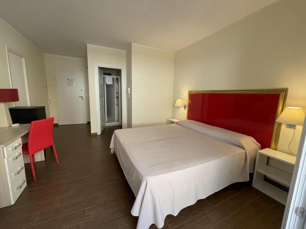 Postel nebo postele na pokoji v ubytování Felicity Residence