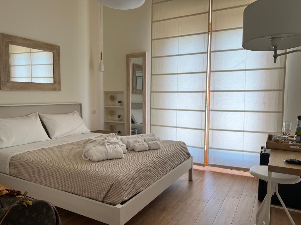 Postel nebo postele na pokoji v ubytování 4B B&B