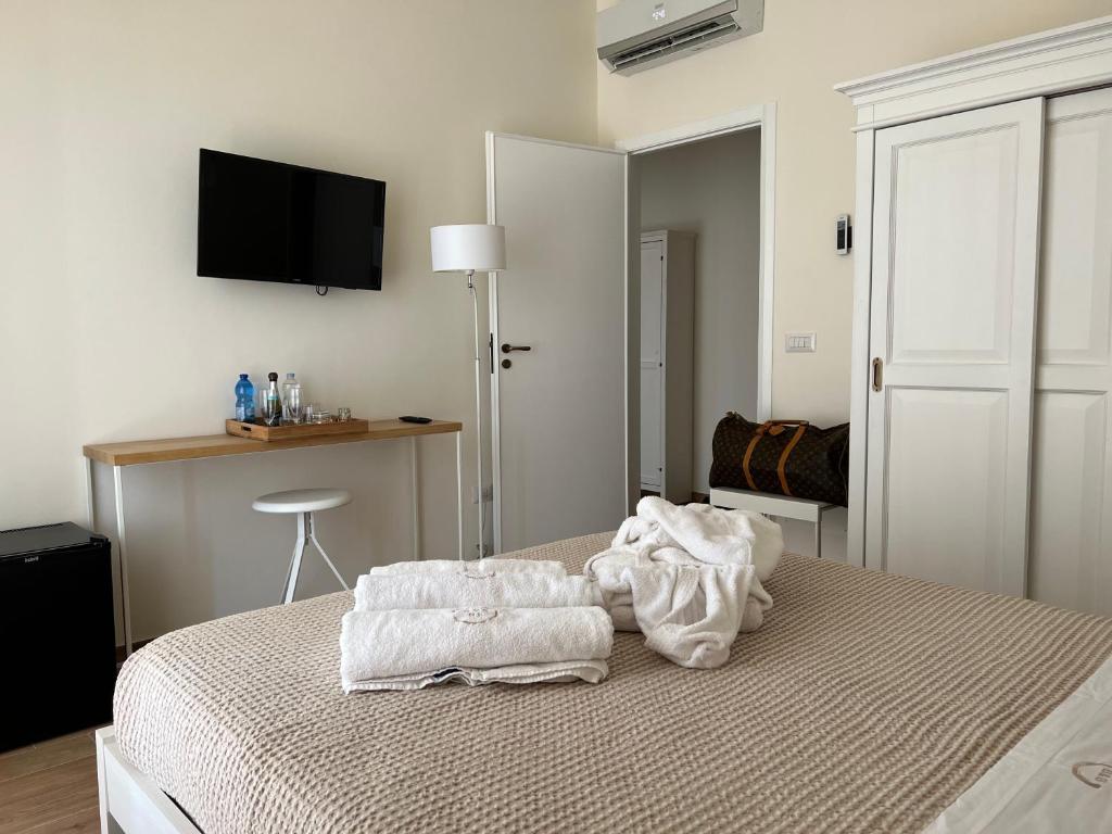 Postel nebo postele na pokoji v ubytování 4B B&B