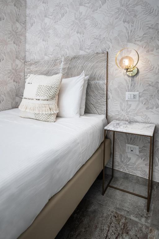 Postel nebo postele na pokoji v ubytování Hotel Brennero