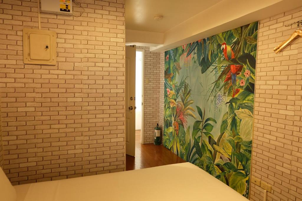 Postel nebo postele na pokoji v ubytování Spaces Hotel Makati