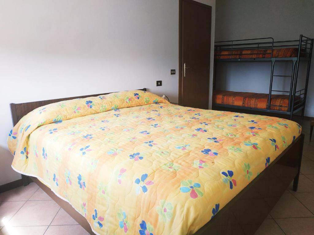Ένα ή περισσότερα κρεβάτια σε δωμάτιο στο B&B L'uva Fragolina