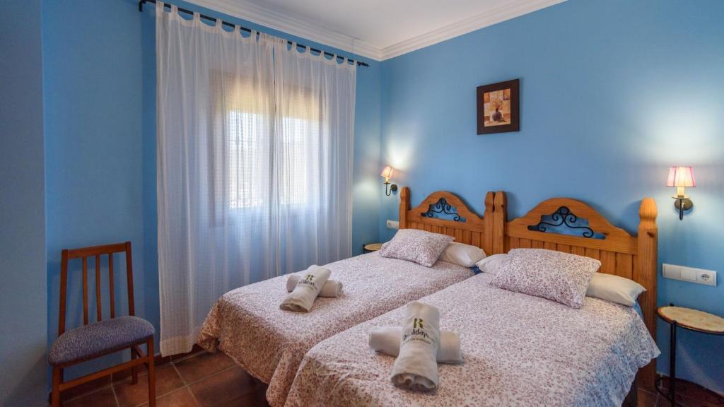 Posteľ alebo postele v izbe v ubytovaní Casa Casana Almáchar by Ruralidays