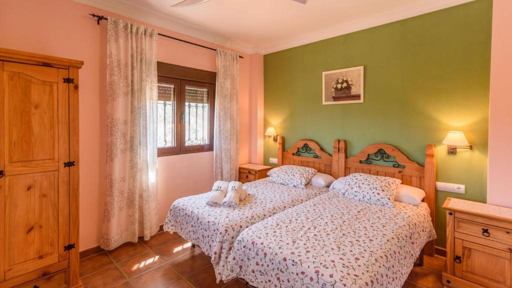 Posteľ alebo postele v izbe v ubytovaní Casa Casana Almáchar by Ruralidays
