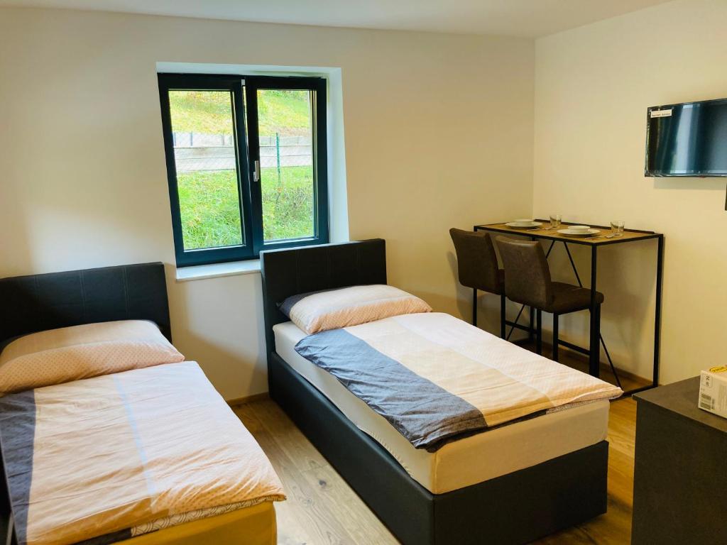 Postel nebo postele na pokoji v ubytování Rittertal