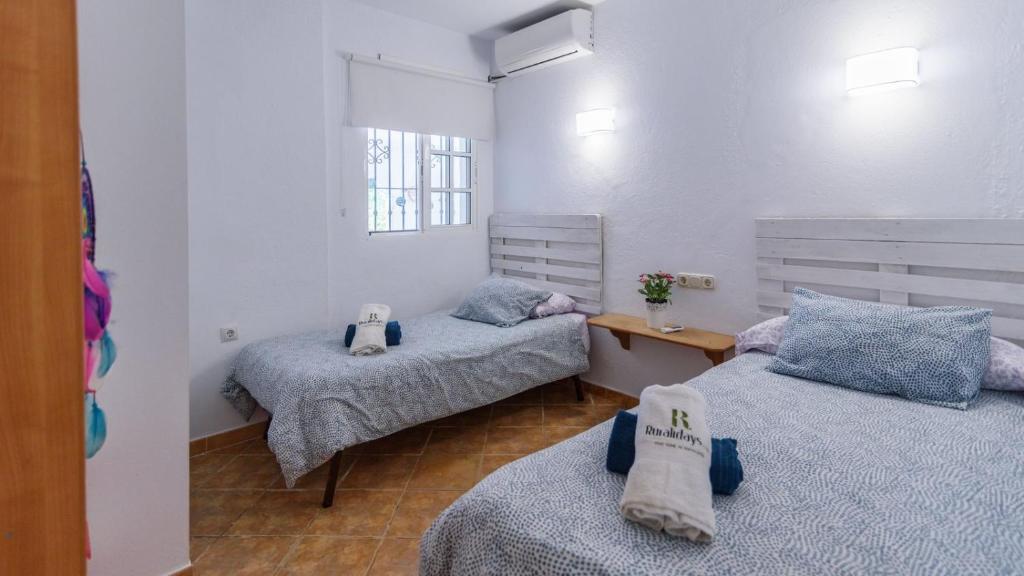 Postel nebo postele na pokoji v ubytování Villa Los Arcos Alhaurín de la Torre by Ruralidays