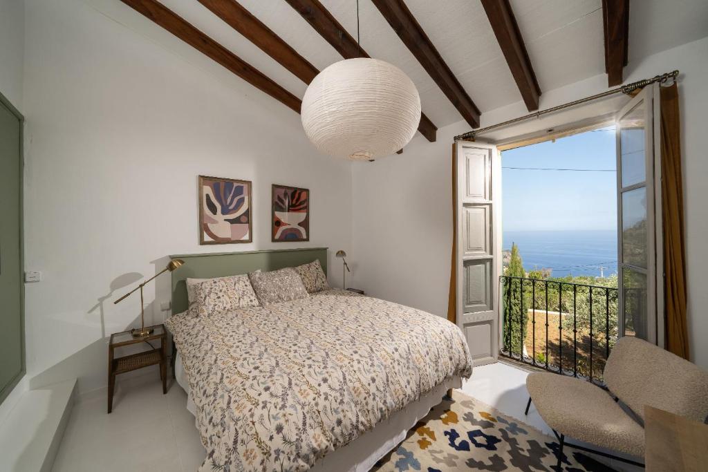 A bed or beds in a room at CA'N QUINN