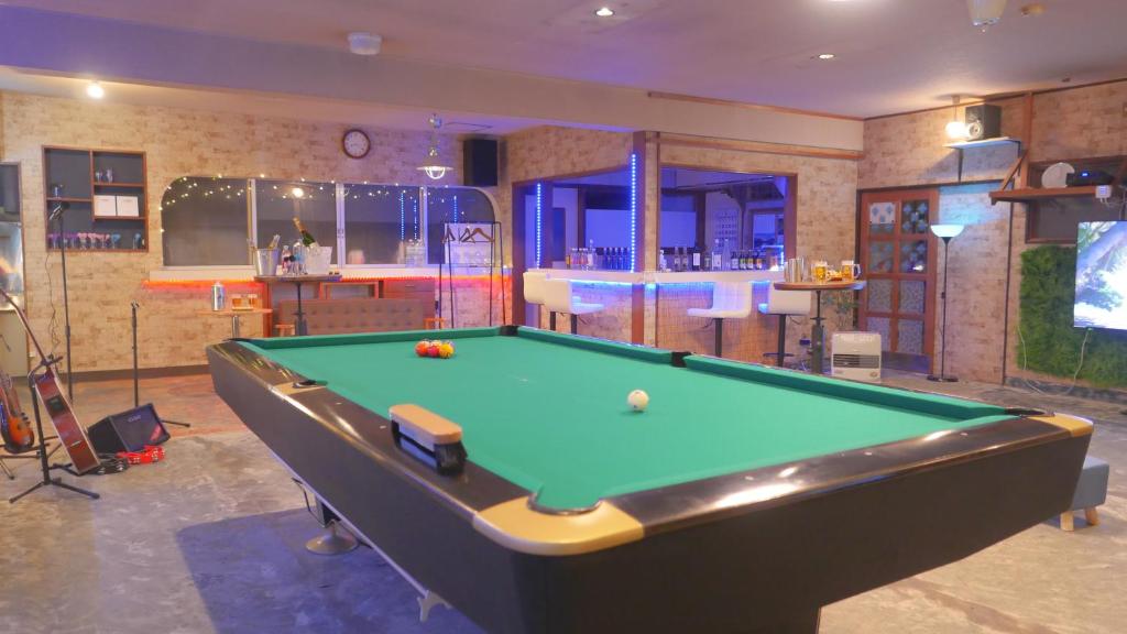 a billiard room with a pool table in it at The HOTEL YUZAWA STARDUST in Yuzawa
