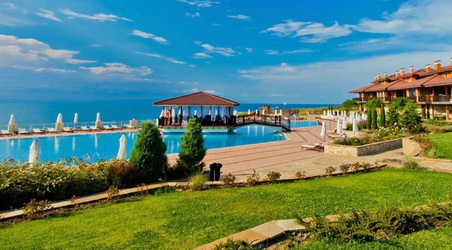 a resort with a pool and a gazebo at Villa 44 SozopoliS in Sozopol