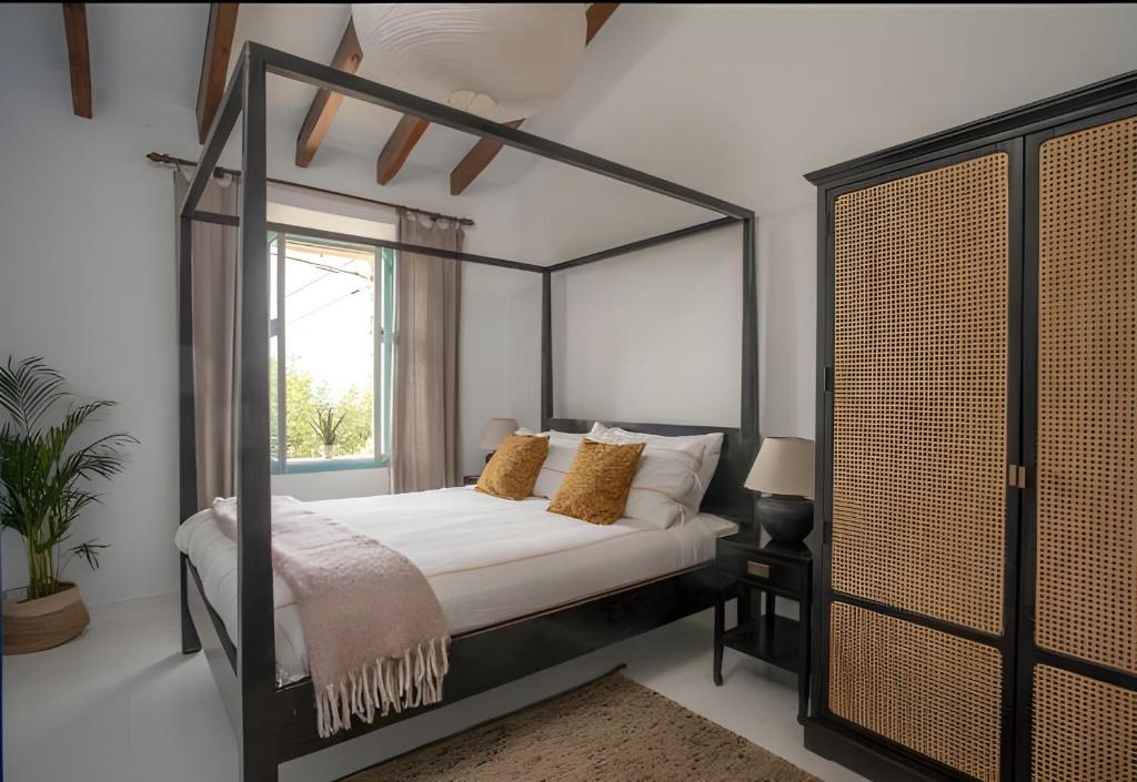 A bed or beds in a room at CA'N QUINN