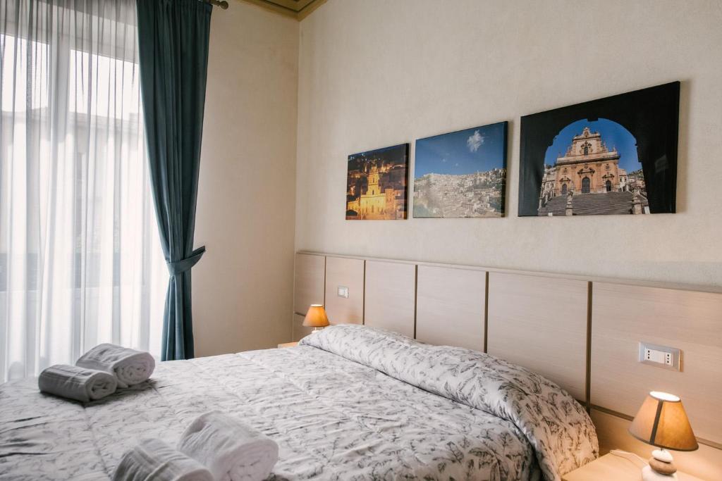 Postel nebo postele na pokoji v ubytování Le Camere dei Conti