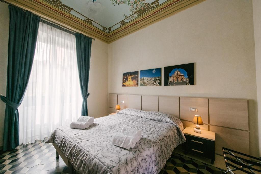 Postel nebo postele na pokoji v ubytování Le Camere dei Conti