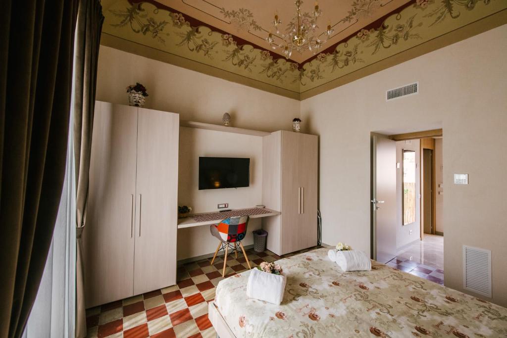 Postel nebo postele na pokoji v ubytování Le Camere dei Conti