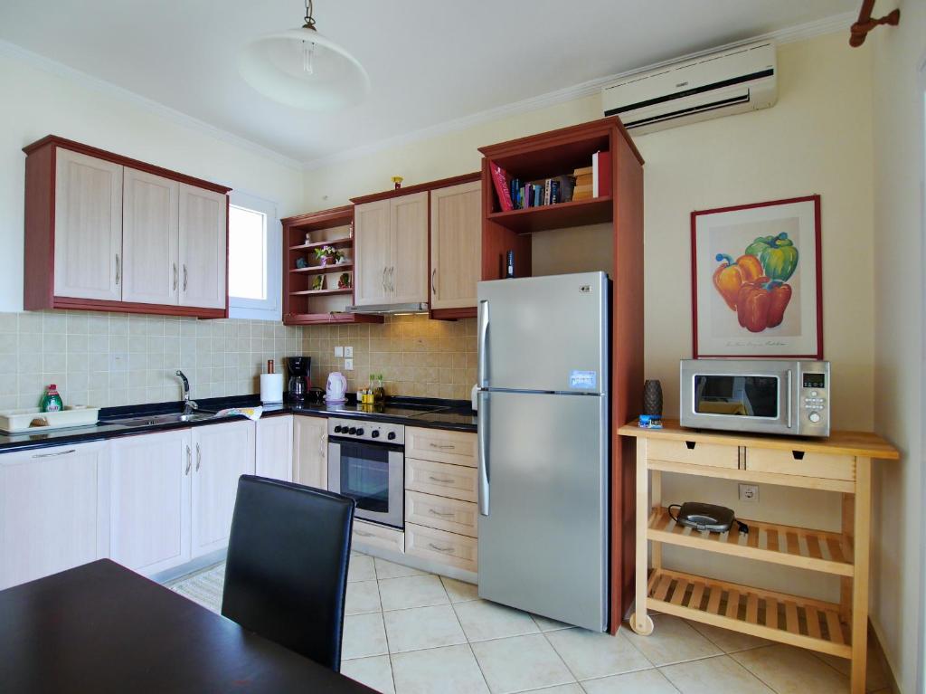 A kitchen or kitchenette at Villa Seagull