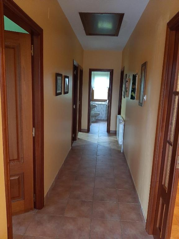 a hallway of a house with a hallwayngth at Casa Herbellas in Cedeira