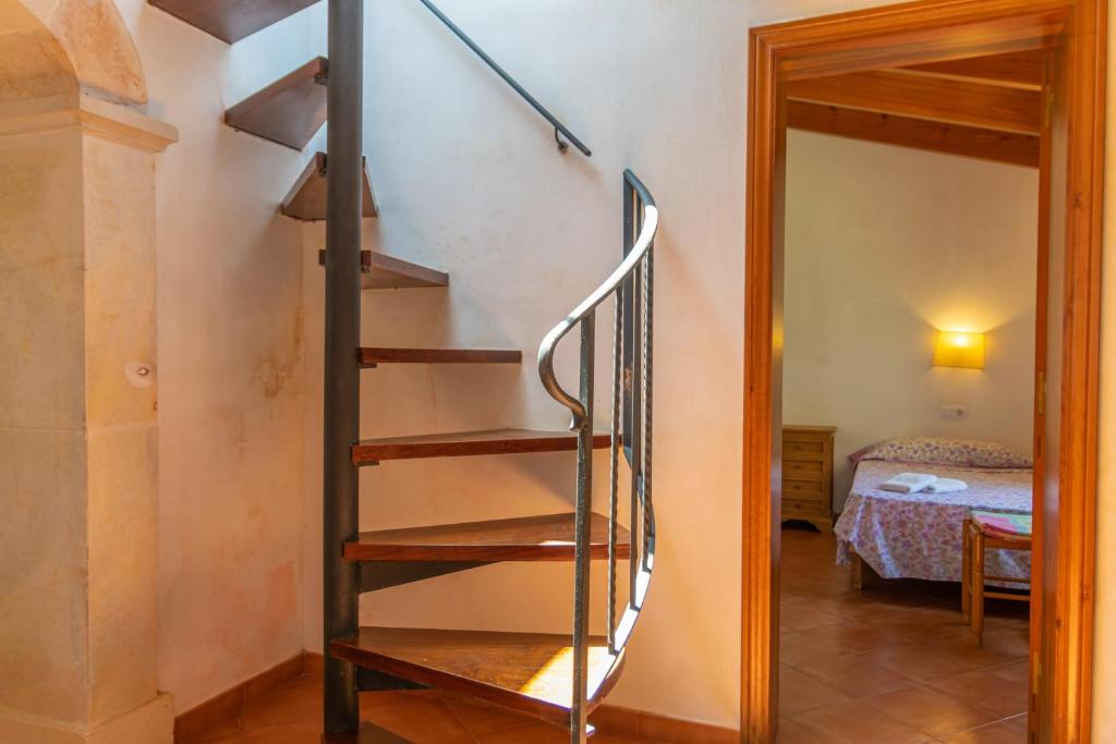 Postel nebo postele na pokoji v ubytování Talaia d'Artrutx