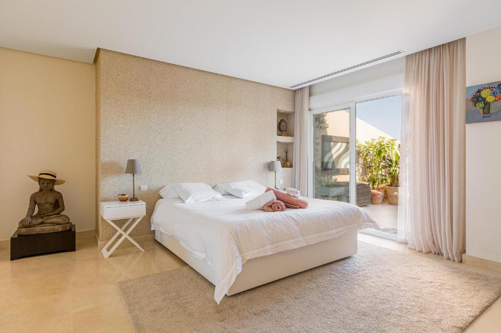 Postel nebo postele na pokoji v ubytování Penthouse Rental Puerto Banus
