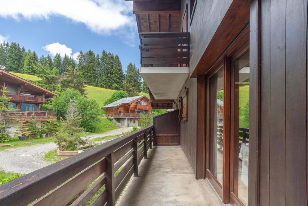 a balcony of a house with a view of a mountain at Chalet Jade in Saint-Gervais-les-Bains