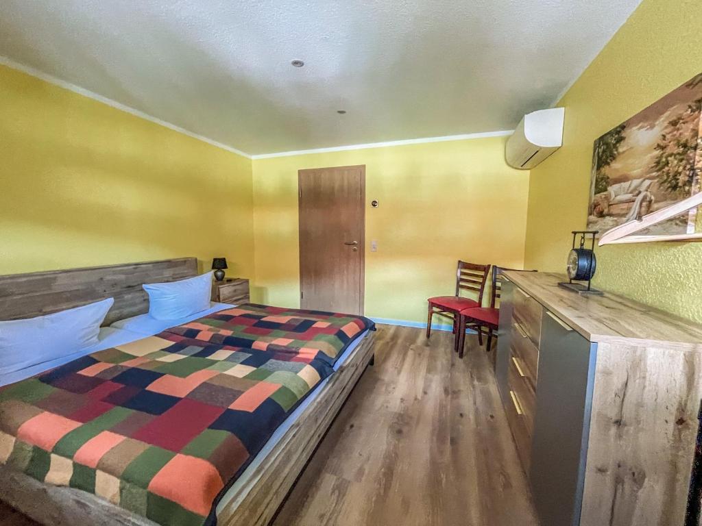 Postel nebo postele na pokoji v ubytování Altwernigeröder Apparthotel