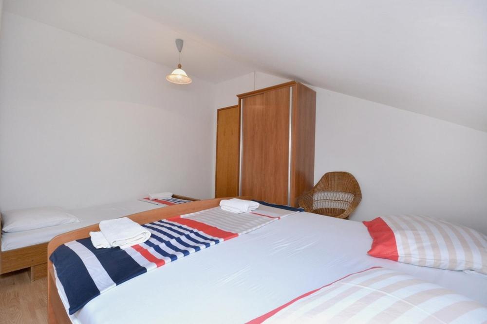 Posteľ alebo postele v izbe v ubytovaní 2-bedroom apartment with large terrace 3558-1