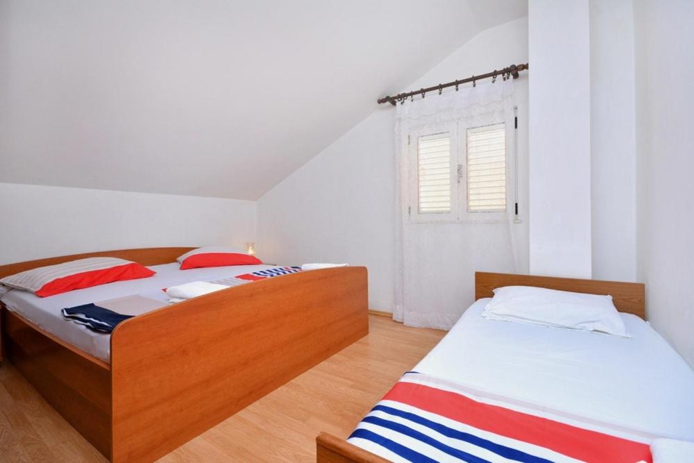 Posteľ alebo postele v izbe v ubytovaní 2-bedroom apartment with large terrace 3558-1