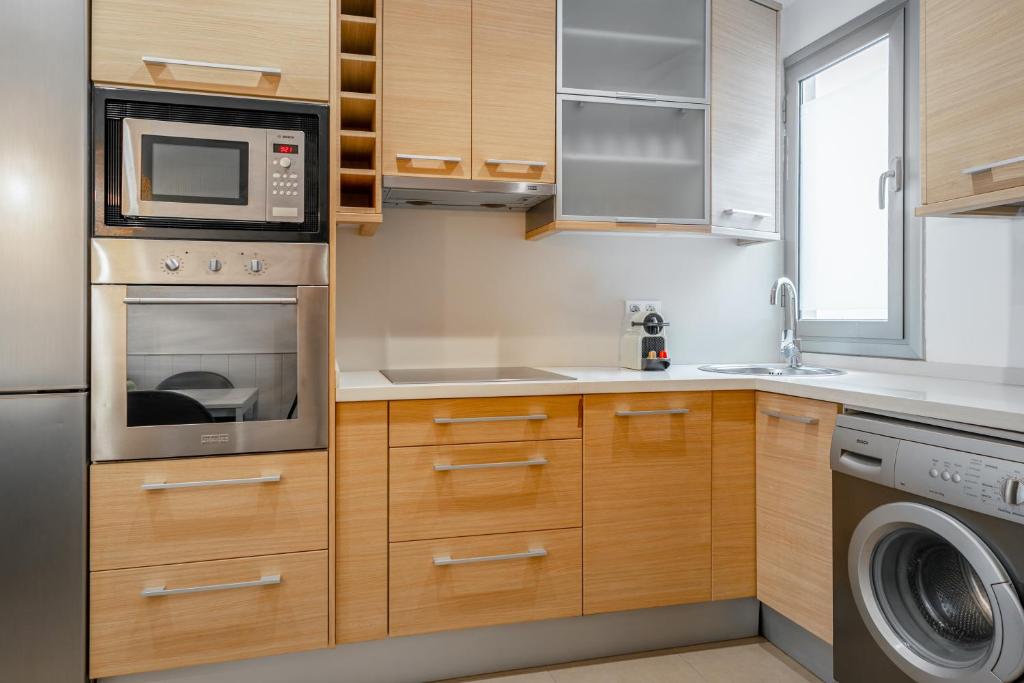 Kuchyň nebo kuchyňský kout v ubytování Inside Barcelona Apartments Salva