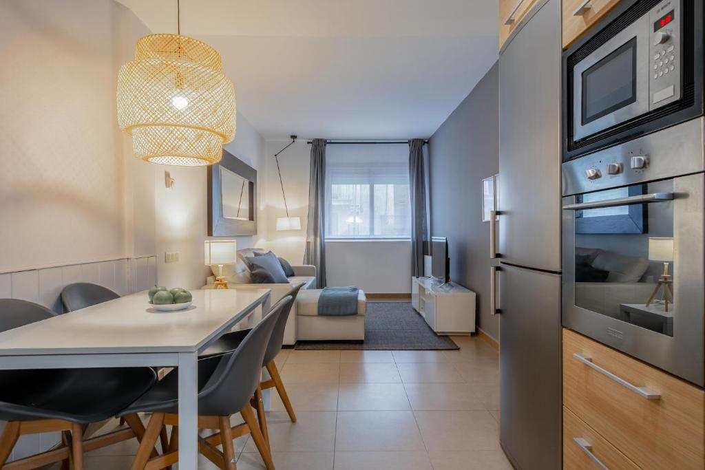 Kuchyň nebo kuchyňský kout v ubytování Inside Barcelona Apartments Salva