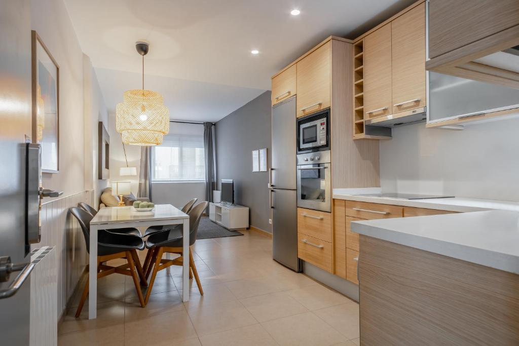 Kuchyň nebo kuchyňský kout v ubytování Inside Barcelona Apartments Salva