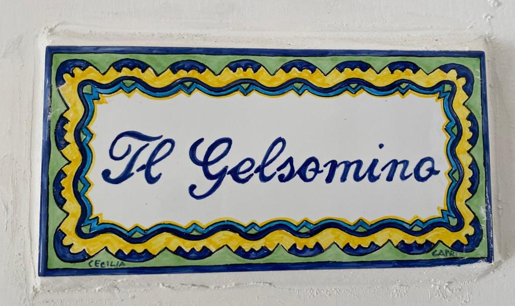 Um certificado, prêmio, placa ou outro documento exibido em Villa Striano Boutique