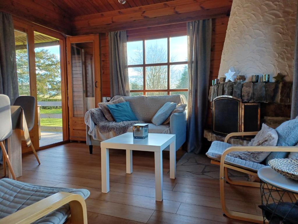 Posezení v ubytování Le Numéro 12 - Chalet à Francorchamps
