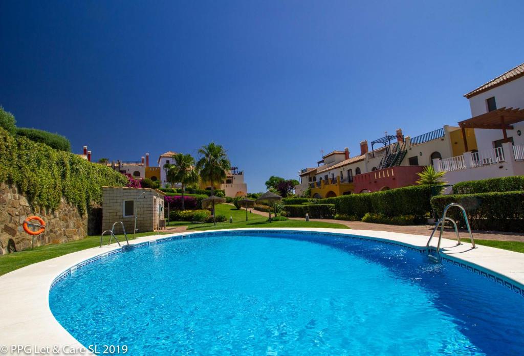 Bazén v ubytování (WAR002) Town House with Garden and Pool Access nebo v jeho okolí