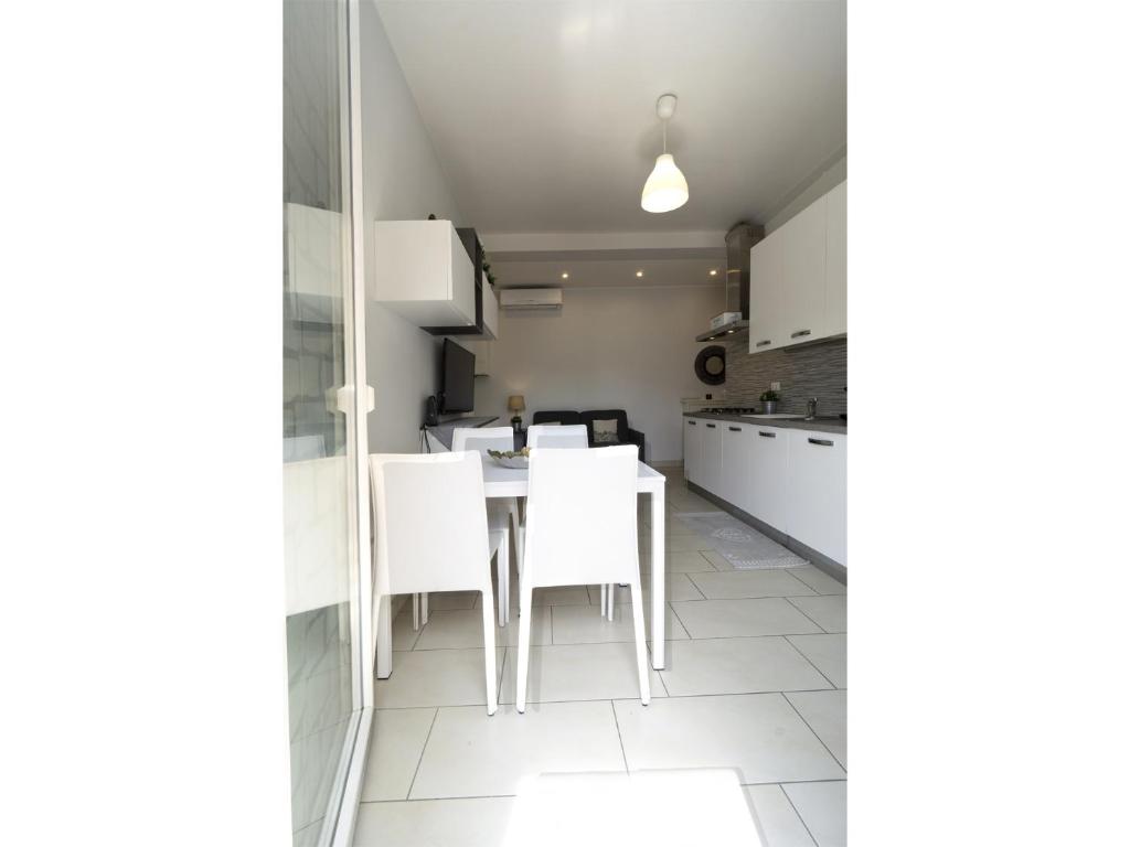 A kitchen or kitchenette at GetTheKey Pasubio Apartment