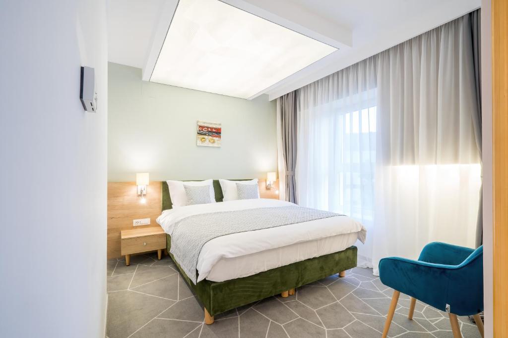 Postel nebo postele na pokoji v ubytování Hotel Console