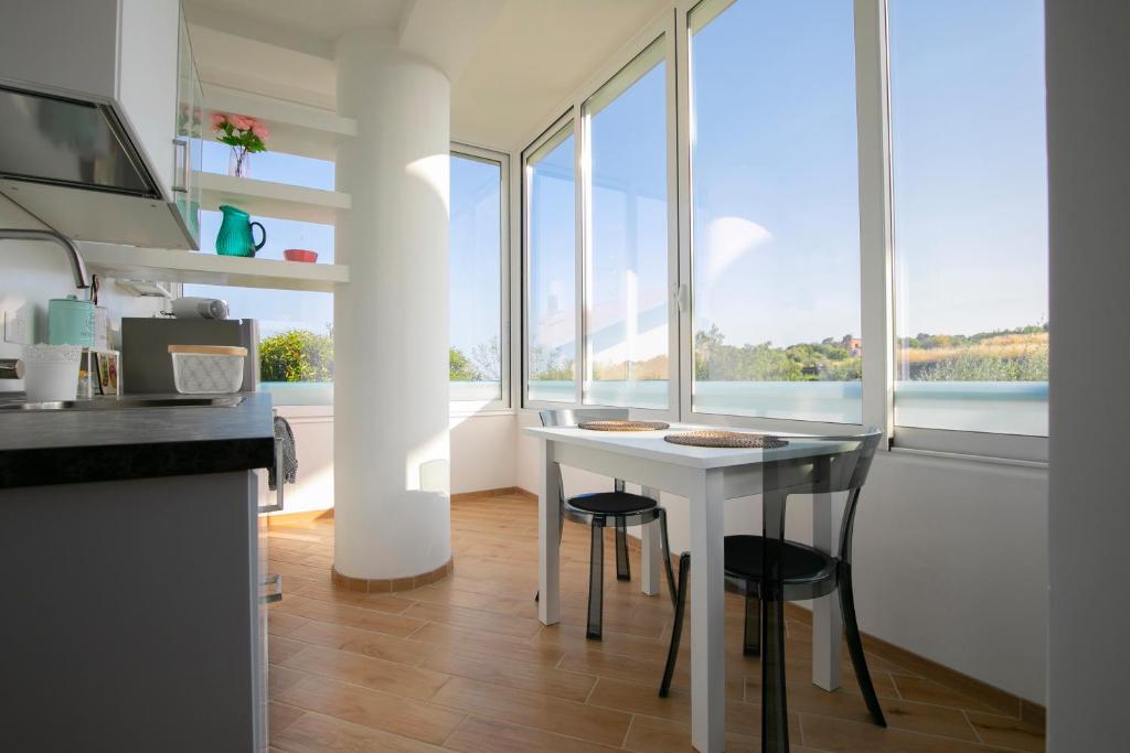 A kitchen or kitchenette at Casa Floramundi