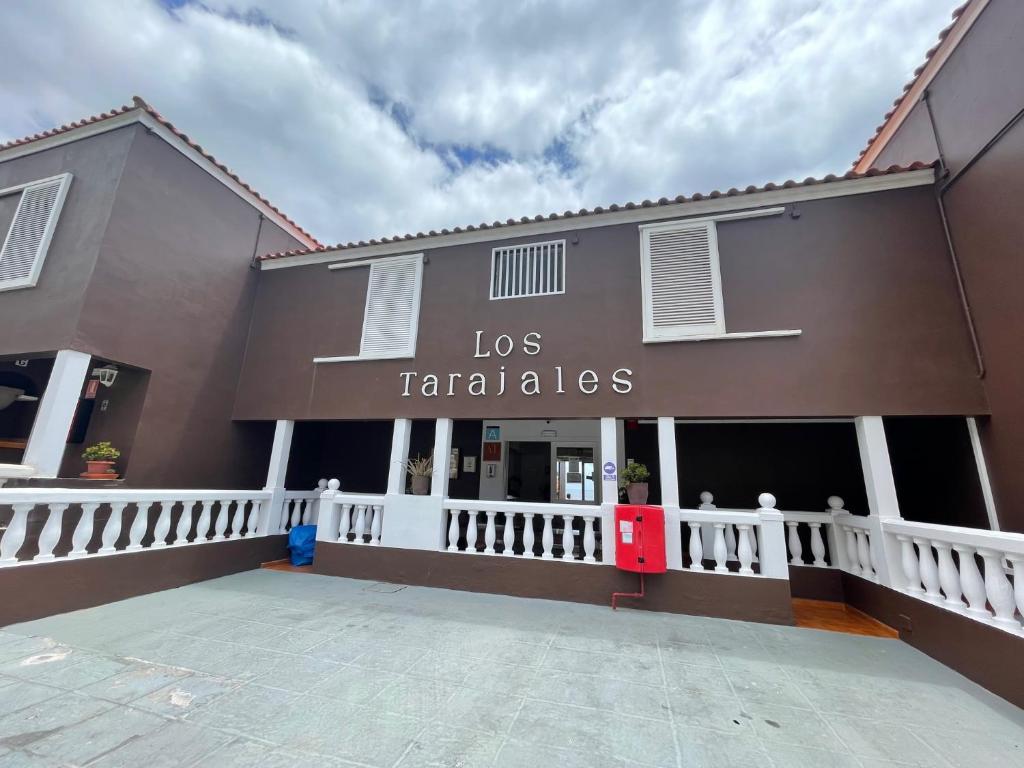 a building with a sign that reads los tamales at Apartamentos Los Tarajales in Valle Gran Rey