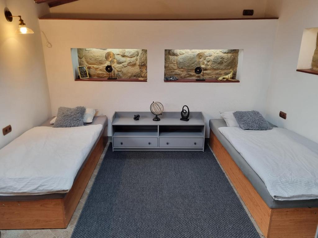 Postel nebo postele na pokoji v ubytování Apartmany Vila Lucia 6