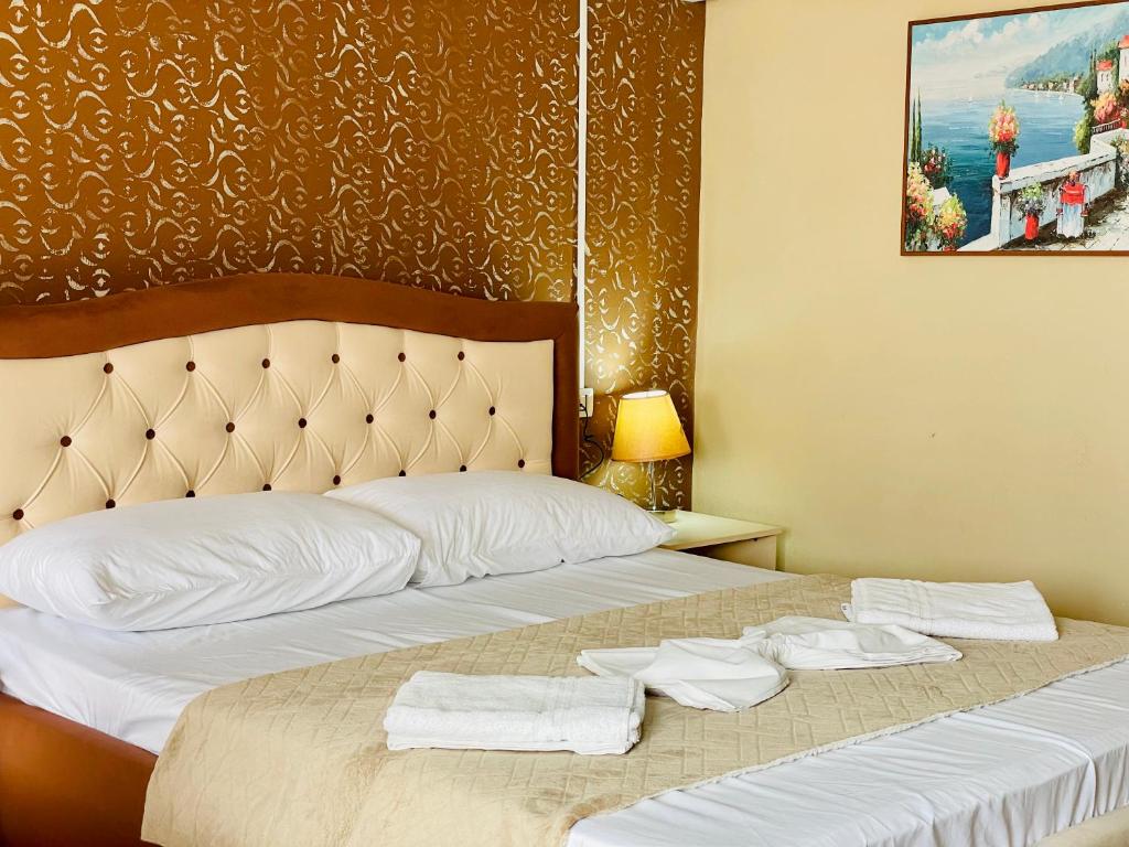 Postel nebo postele na pokoji v ubytování Vila3 Hotel