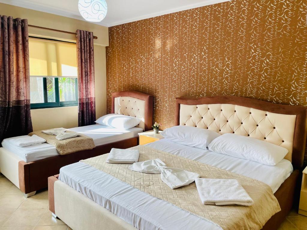 Postel nebo postele na pokoji v ubytování Vila3 Hotel