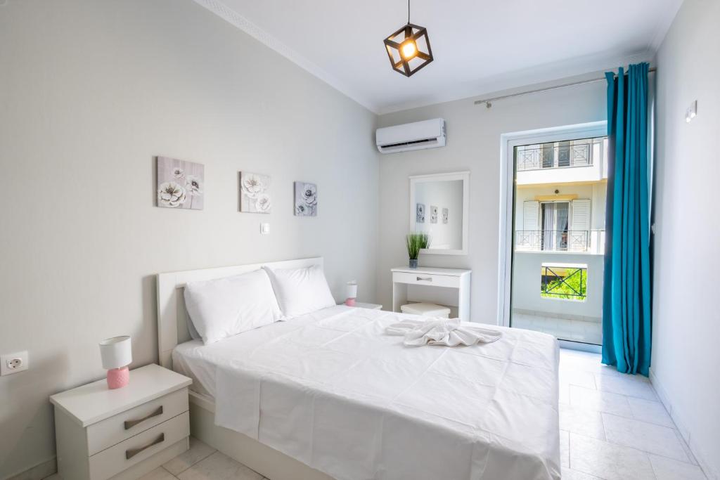 Postel nebo postele na pokoji v ubytování Lilis Apartment 3