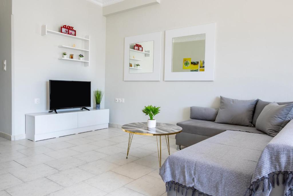 TV a/nebo společenská místnost v ubytování Lilis Apartment 3