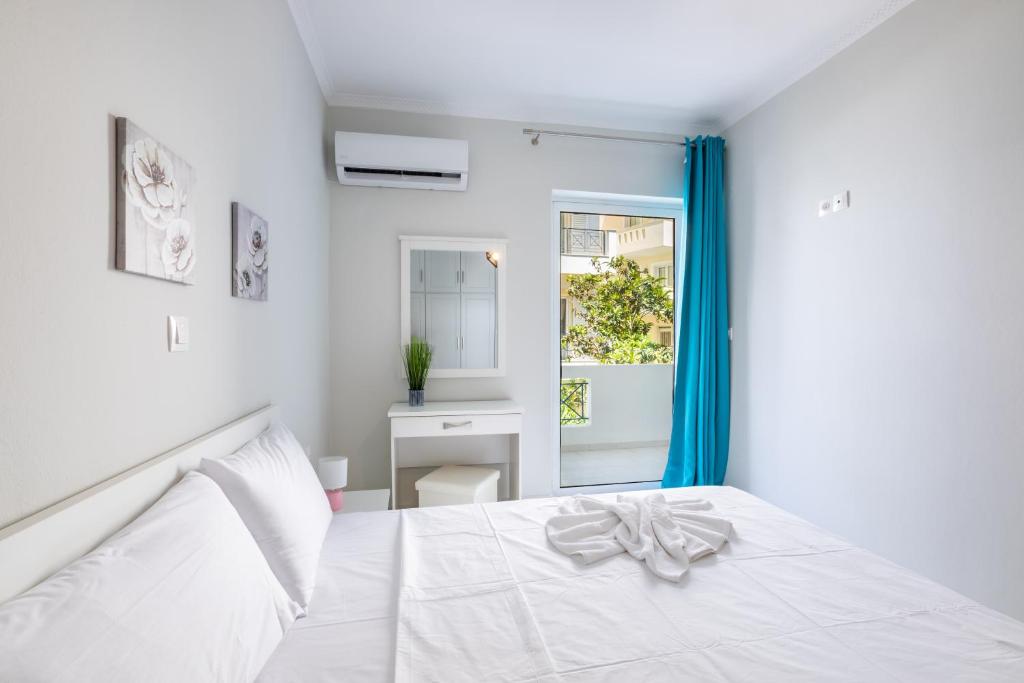 Postel nebo postele na pokoji v ubytování Lilis Apartment 3