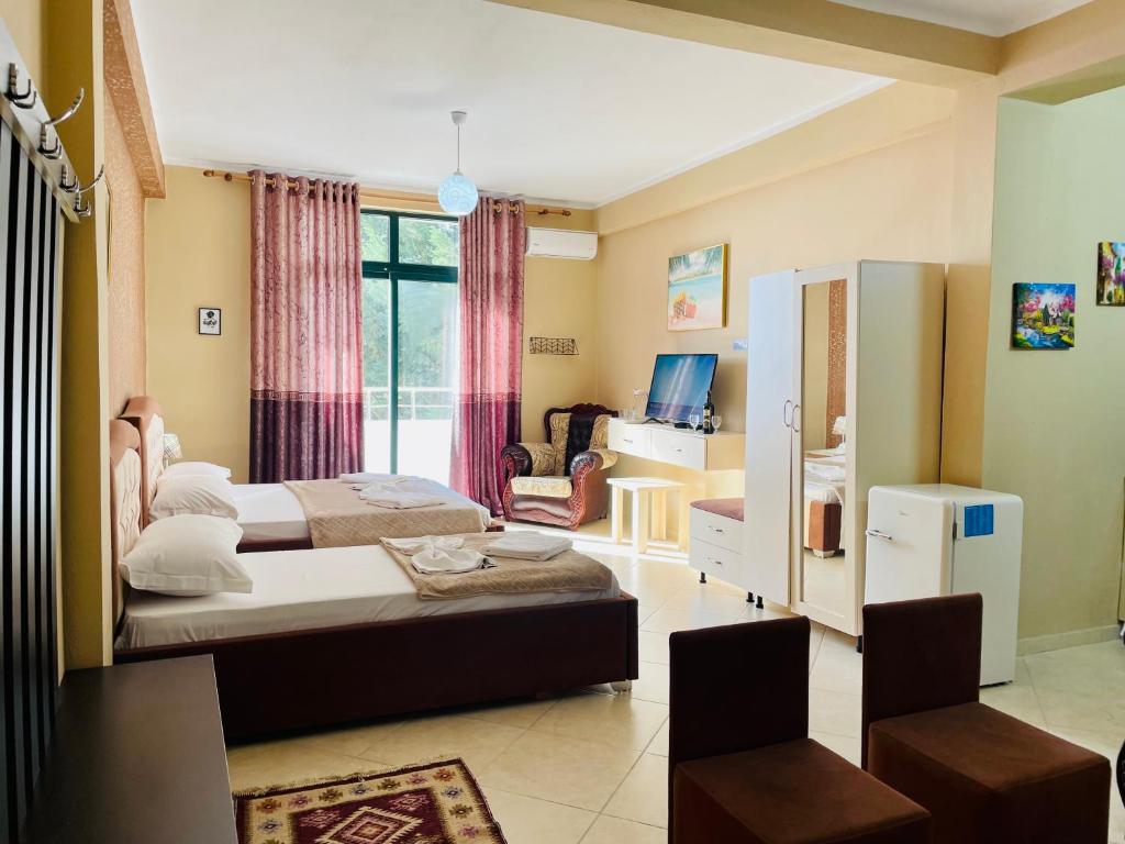 TV a/nebo společenská místnost v ubytování Vila3 Hotel