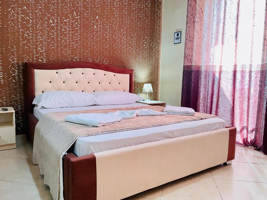 Postel nebo postele na pokoji v ubytování Vila3 Hotel