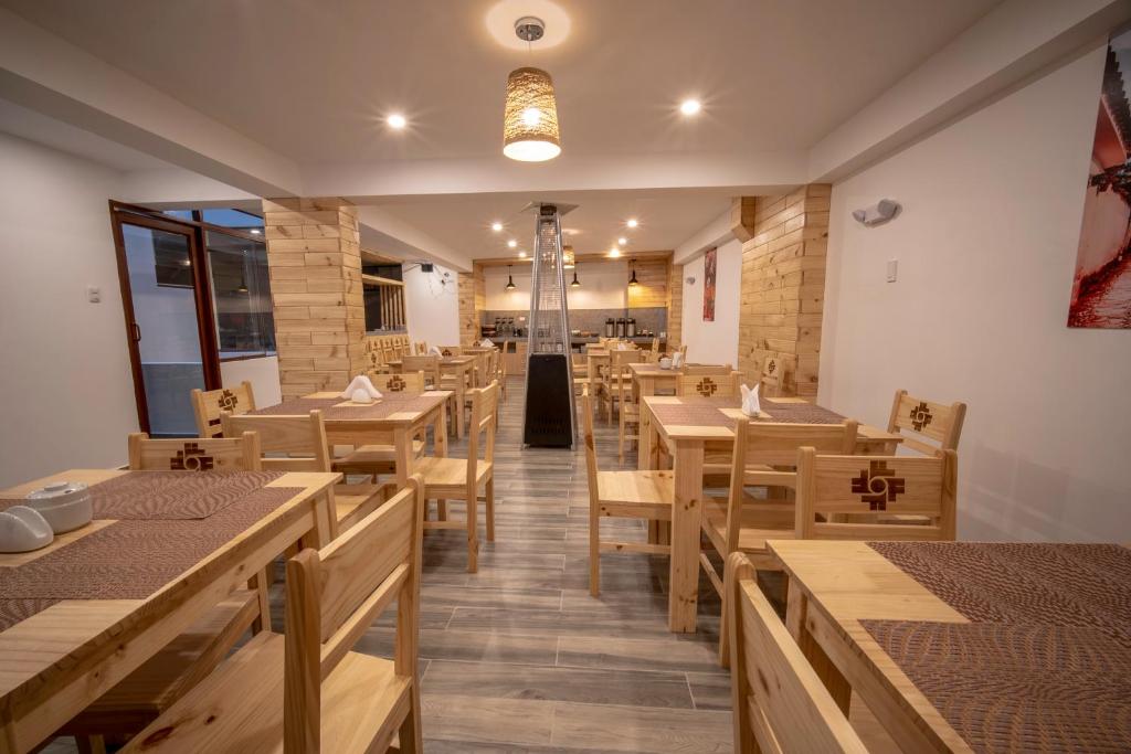 Restoran või mõni muu söögikoht majutusasutuses Ayni Cusco Hotel