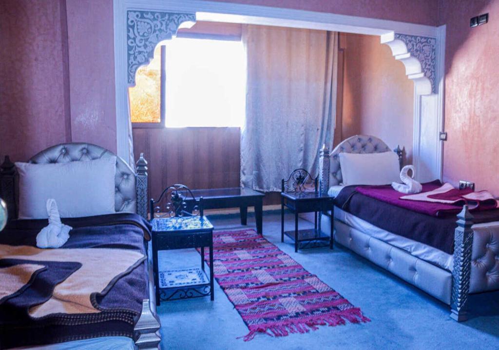 Postel nebo postele na pokoji v ubytování Hôtel Restaurant Les Etoiles Du Toubkal